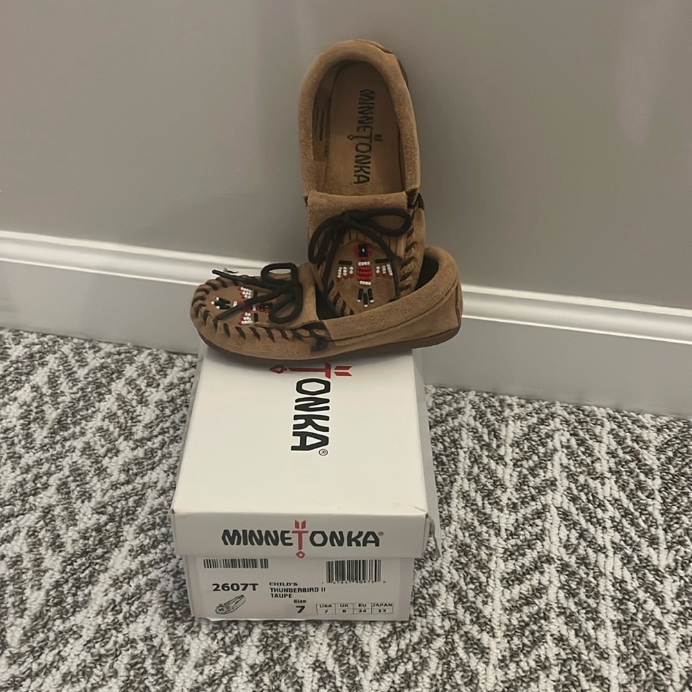 Never worn, Child’s thunderbird II taupe size 7